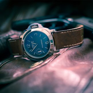 Dress watch on a flat surface.